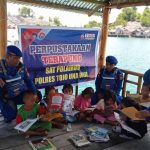 Tumbuhkan Minat Baca Warga, Satpolairud Polres Touna Hadirkan Perpustakaan Terapung