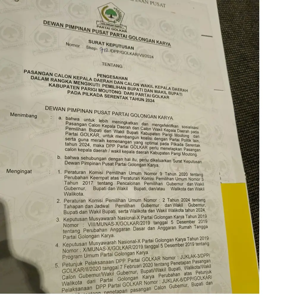 Erwin Burase-Abdul Sahid Terima Penetapan Golkar di Jumat Keramat