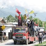 Kawal Rizal – Samuel Daftar ke KPU Sigi, Konvoi Kendaraan Loyalis Pasangan RESMI Mengular