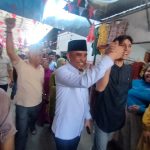 Momen Perayaan Maulid Nabi, Anwar-Reny Kunjungi Pedagang di Pasar Masomba Palu  