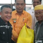 Kerjasama Baznas Palu, Wali Kota Hadianto Serahkan Bantuan kepada 219 Dhuafa